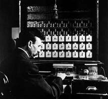 Hollerith demonstrates the tabulating machine's card reader