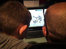 Un père et son fils sur le Scientific Discovery Game "Fold-it"